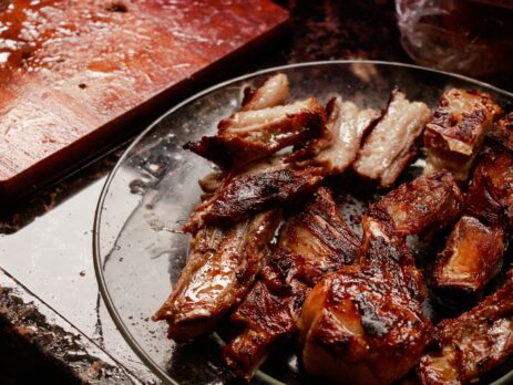 Marinated and grilled pork on a plate.